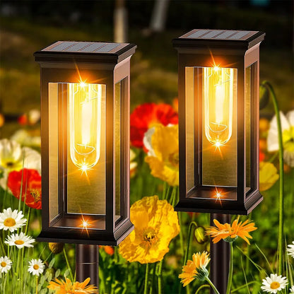 4x saulės energija varomi sodo šviestuvai, dekoratyviniai IP65 lauko žibintai