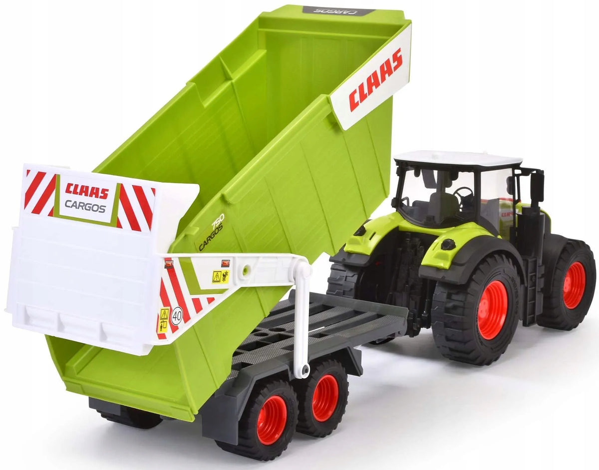 Interaktyvus „Claas“ traktorius su priekaba, 64 cm, ir dinozaurų figūrėlės dėžutėje