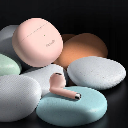 Mcdodo Earbuds Lite HP-8032 belaidės rožinės ausinės su mikrofonu ir įkrovimo dėklu