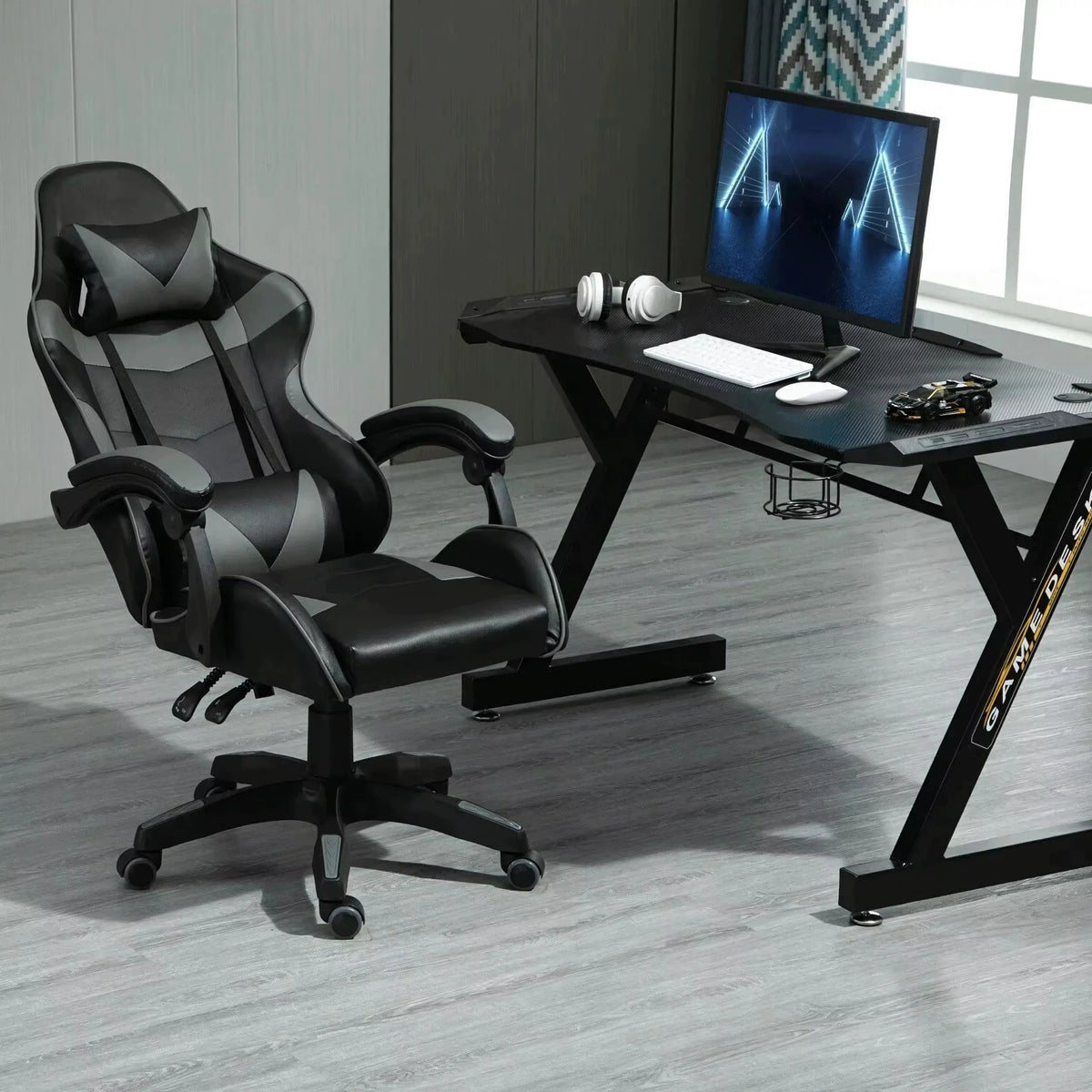 Pasukama gaming kėdė su kojų atrama, kaušo formos, iki 150 kg, pilka ir juoda