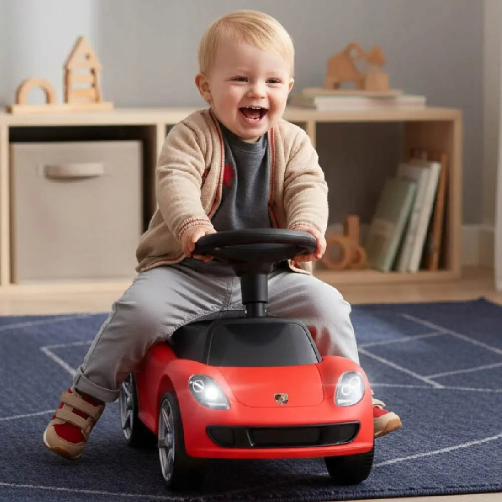 Raudonas vaikiškas paspirtukas-automobiliukas „Porsche Carrera GT“ su šviesomis, „Sun Baby“