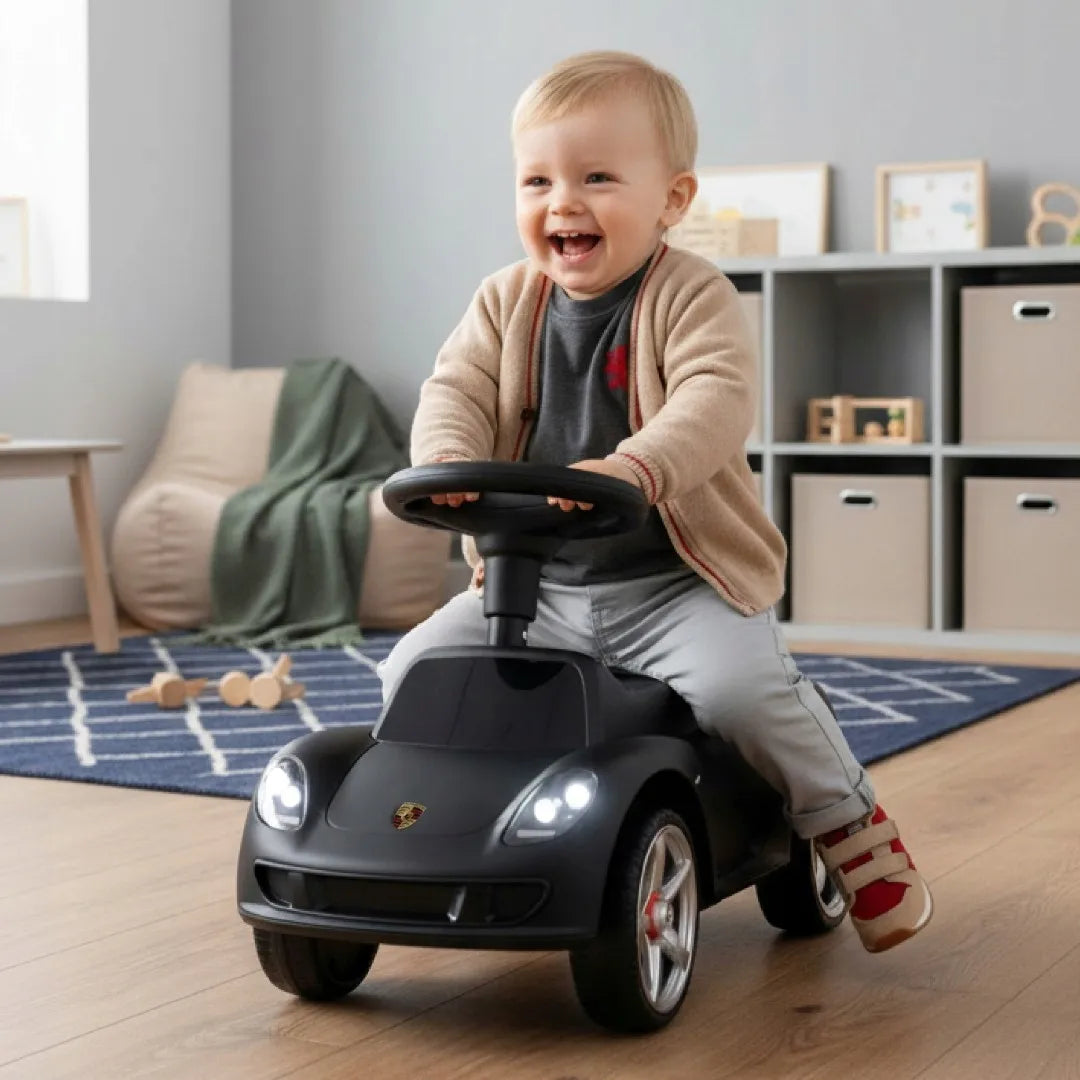 „Sun Baby“ „Porsche Carrera GT“ vaikiškas paspiriamas automobilis su šviesomis, juodas