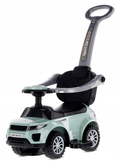 Vaikiškas paspirtukas Sport Car SUN BABY su daiktadėže, pakoju, apsauginiu lankeliu ir garso efektais